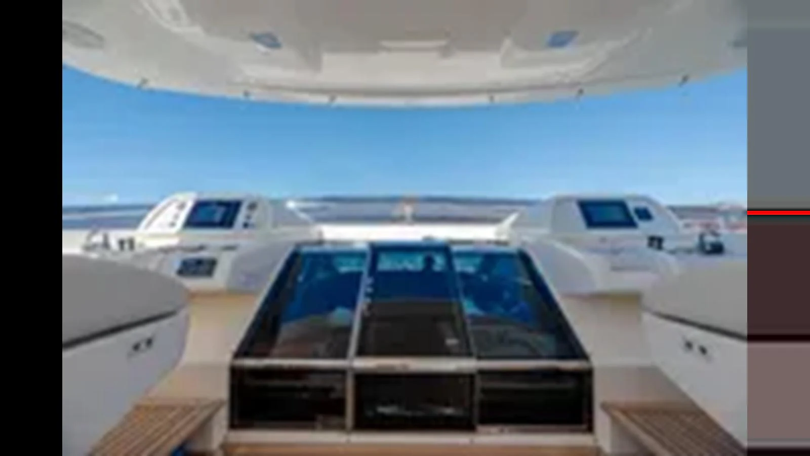 The flybridge offers a spacious and modern area with advanced navigation equipment and panoramic views. aboard 2012 FERRETTI YACHTS CUSTOM LINE 100 Yacht for Sale