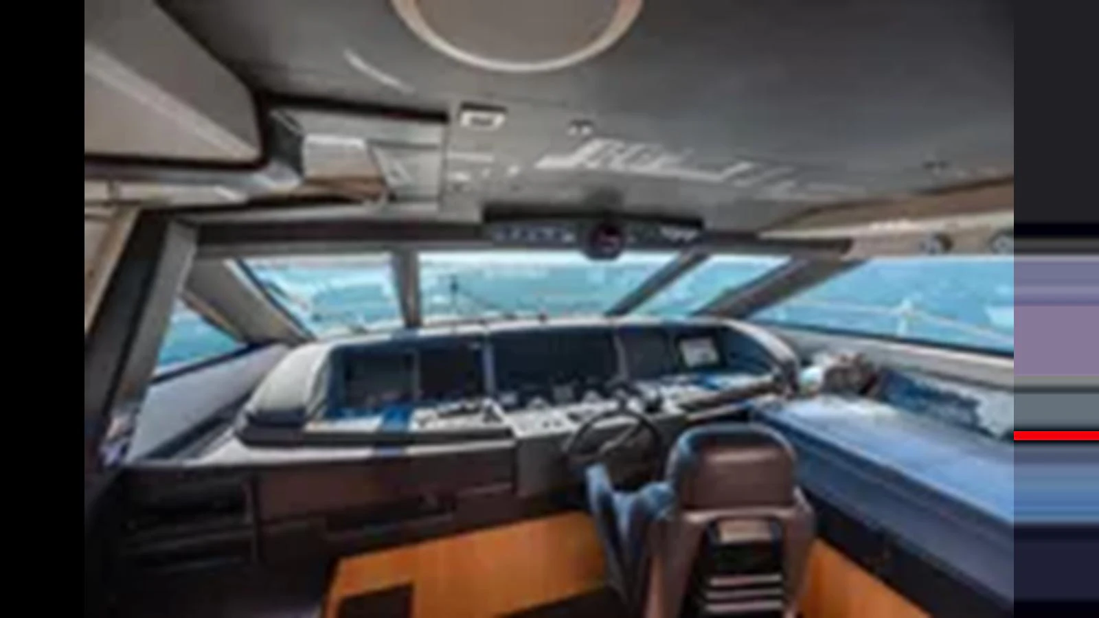 The helm station offers a commanding view with state-of-the-art navigation equipment. aboard 2012 FERRETTI YACHTS CUSTOM LINE 100 Yacht for Sale