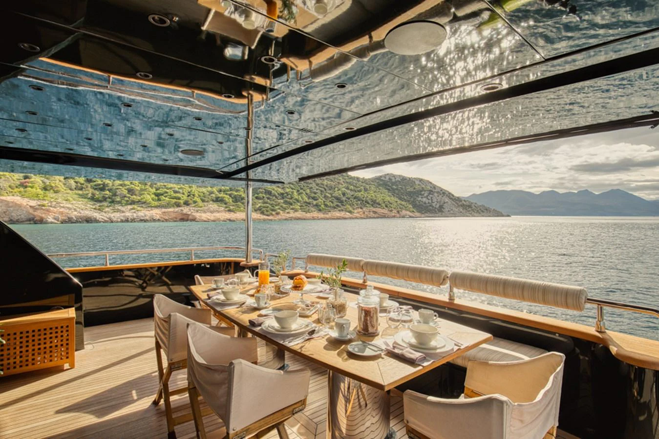 The aft deck offers a luxurious dining experience with stunning sea views. aboard CAN'T REMEMBER Yacht for Sale