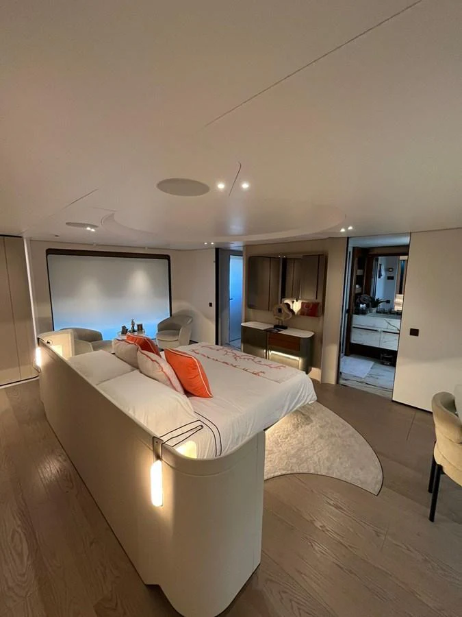 The master stateroom features a luxurious bed with elegant decor and ample space for relaxation. aboard LUZ DE MAR Yacht for Sale