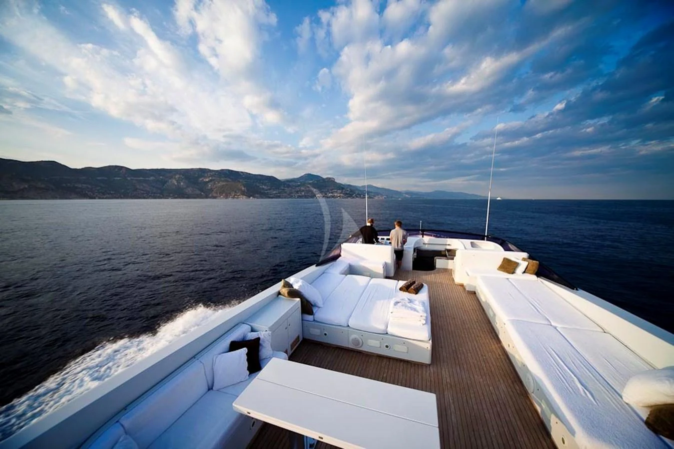 The yacht's aft deck offers a spacious and luxurious lounging area with stunning ocean views. aboard TALILA Yacht for Sale
