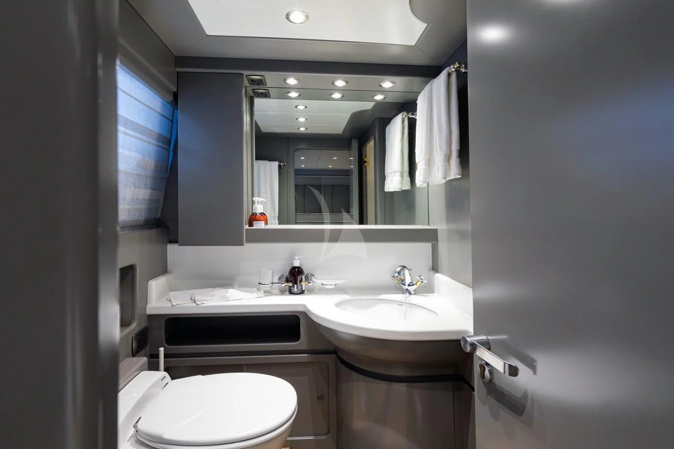 A sleek and modern yacht bathroom with a contemporary design. aboard TALILA Yacht for Sale