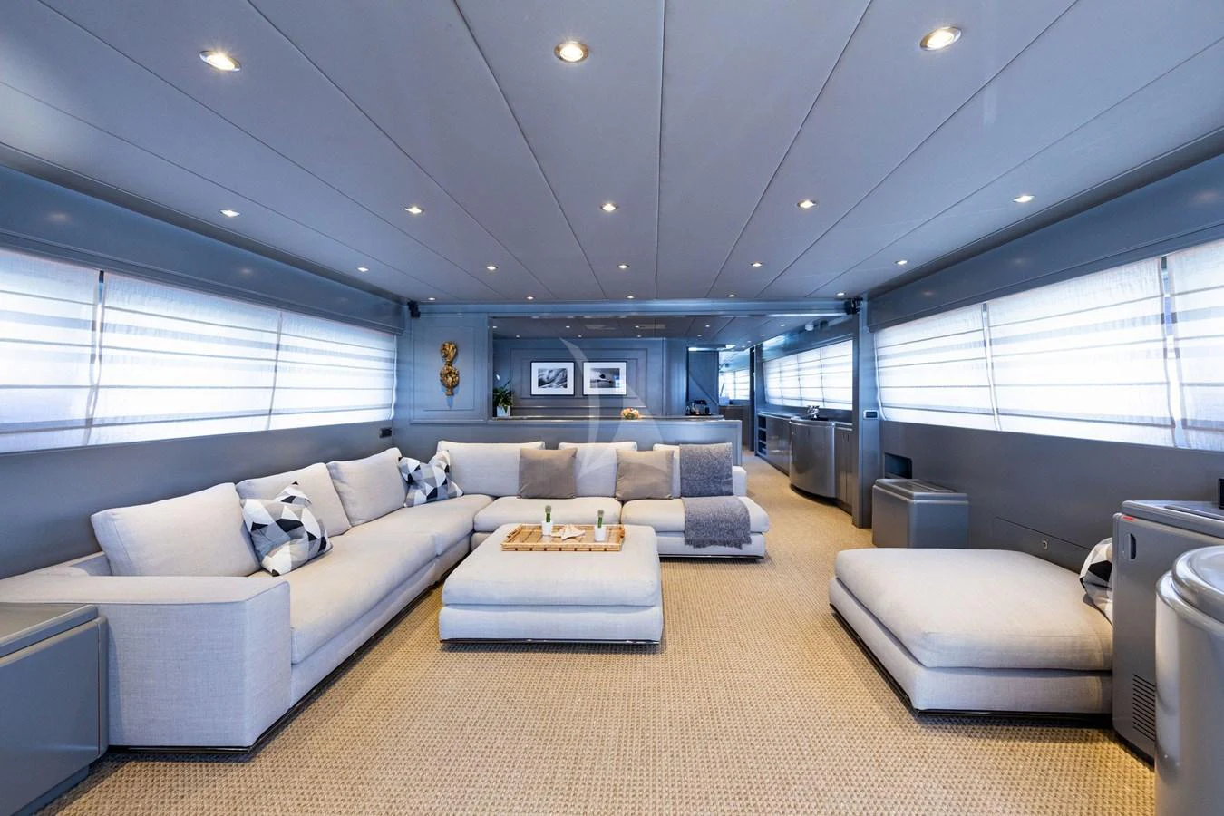 The spacious salon features modern furnishings and ample natural light. aboard TALILA Yacht for Sale