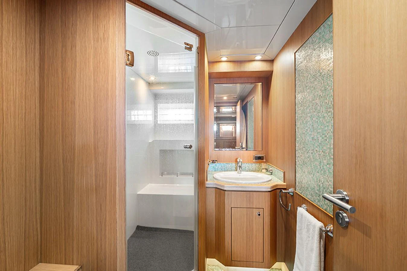The yacht's bathroom features modern fixtures and a clean, elegant design. aboard BANDIDO Yacht for Sale