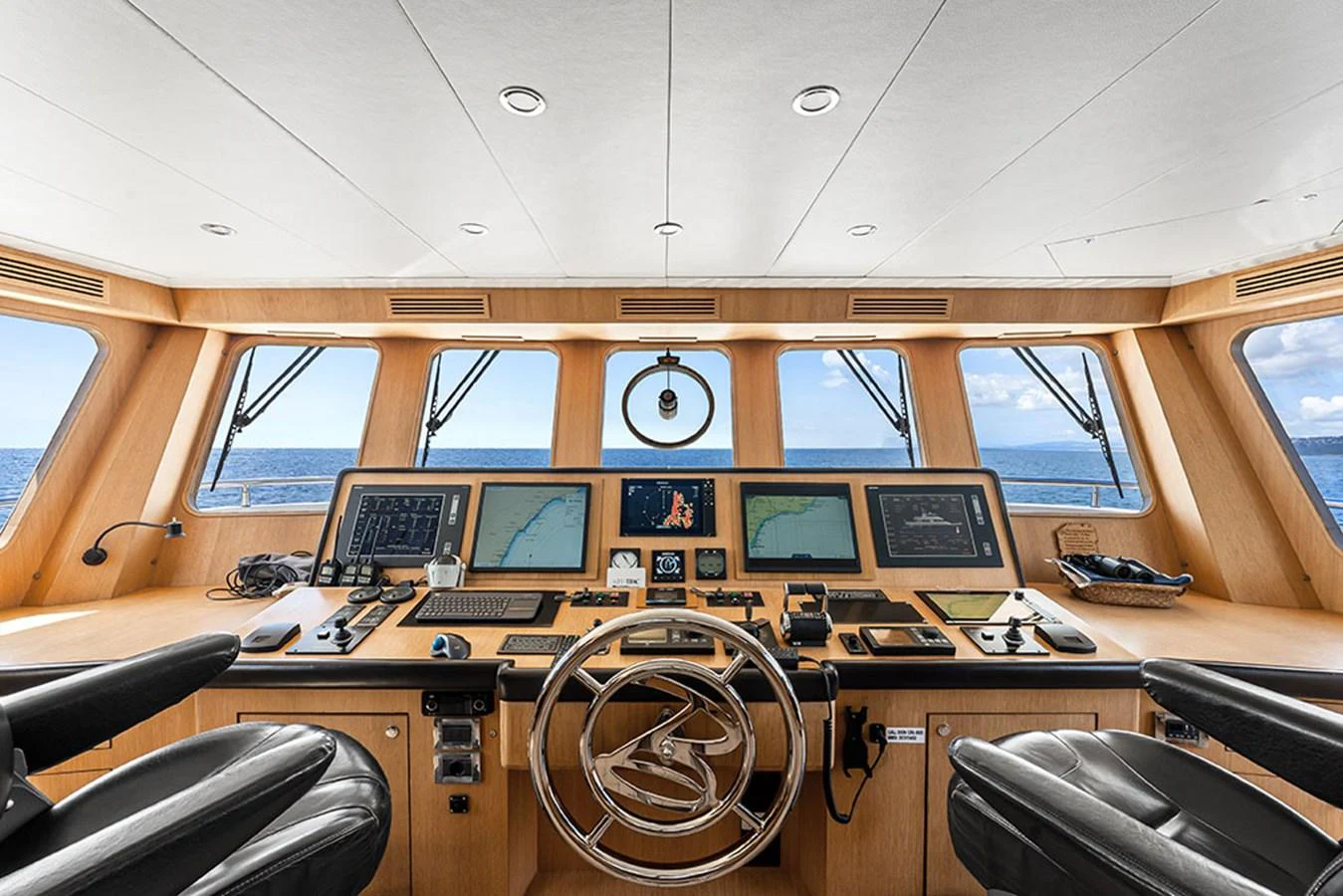 The helm station features advanced navigation equipment and luxurious seating. aboard BANDIDO Yacht for Sale