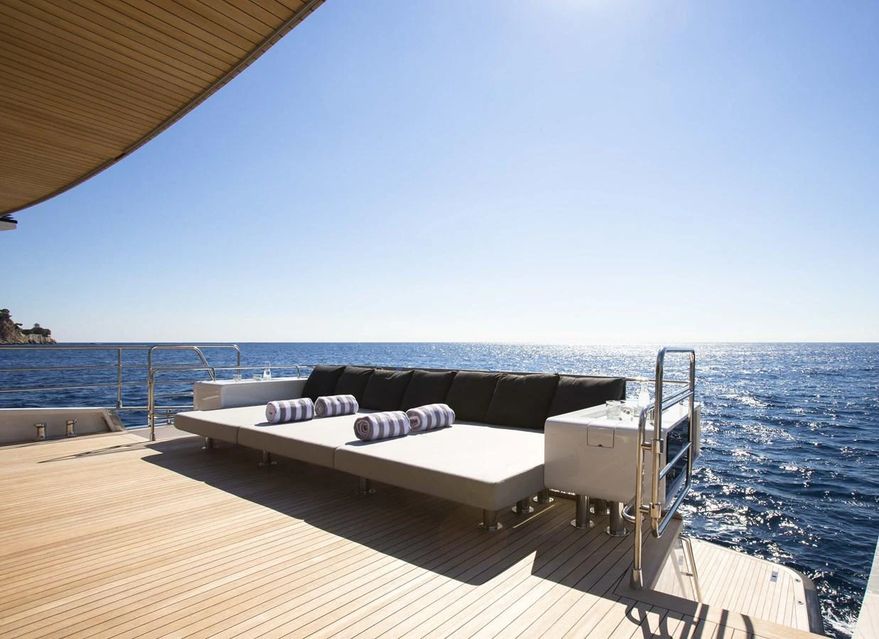 The sundeck offers a luxurious lounging area with panoramic ocean views. aboard CASA Yacht for Sale