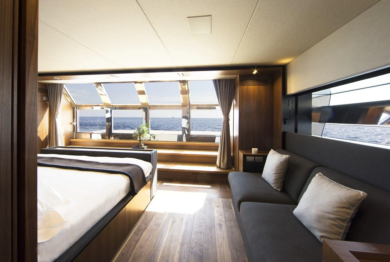 The master stateroom offers a luxurious retreat with panoramic ocean views and elegant furnishings. aboard CASA Yacht for Sale