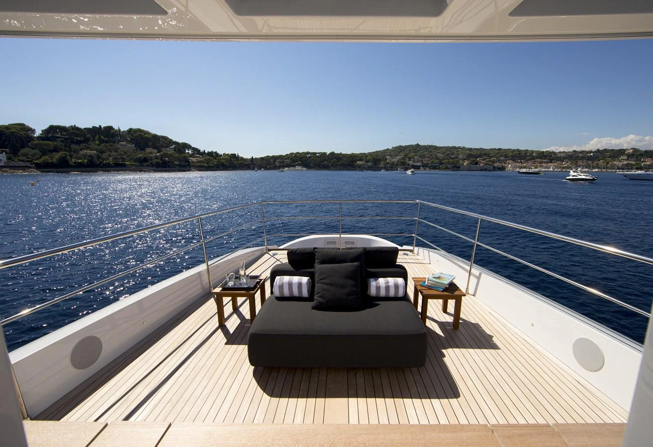 The aft deck offers a serene lounging area with stunning views of the surrounding waters. aboard CASA Yacht for Sale