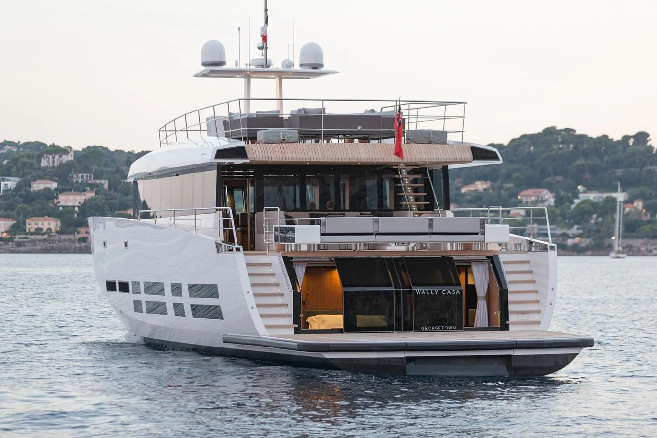 The yacht's aft deck showcases a sleek design with ample space for relaxation and entertainment. aboard CASA Yacht for Sale