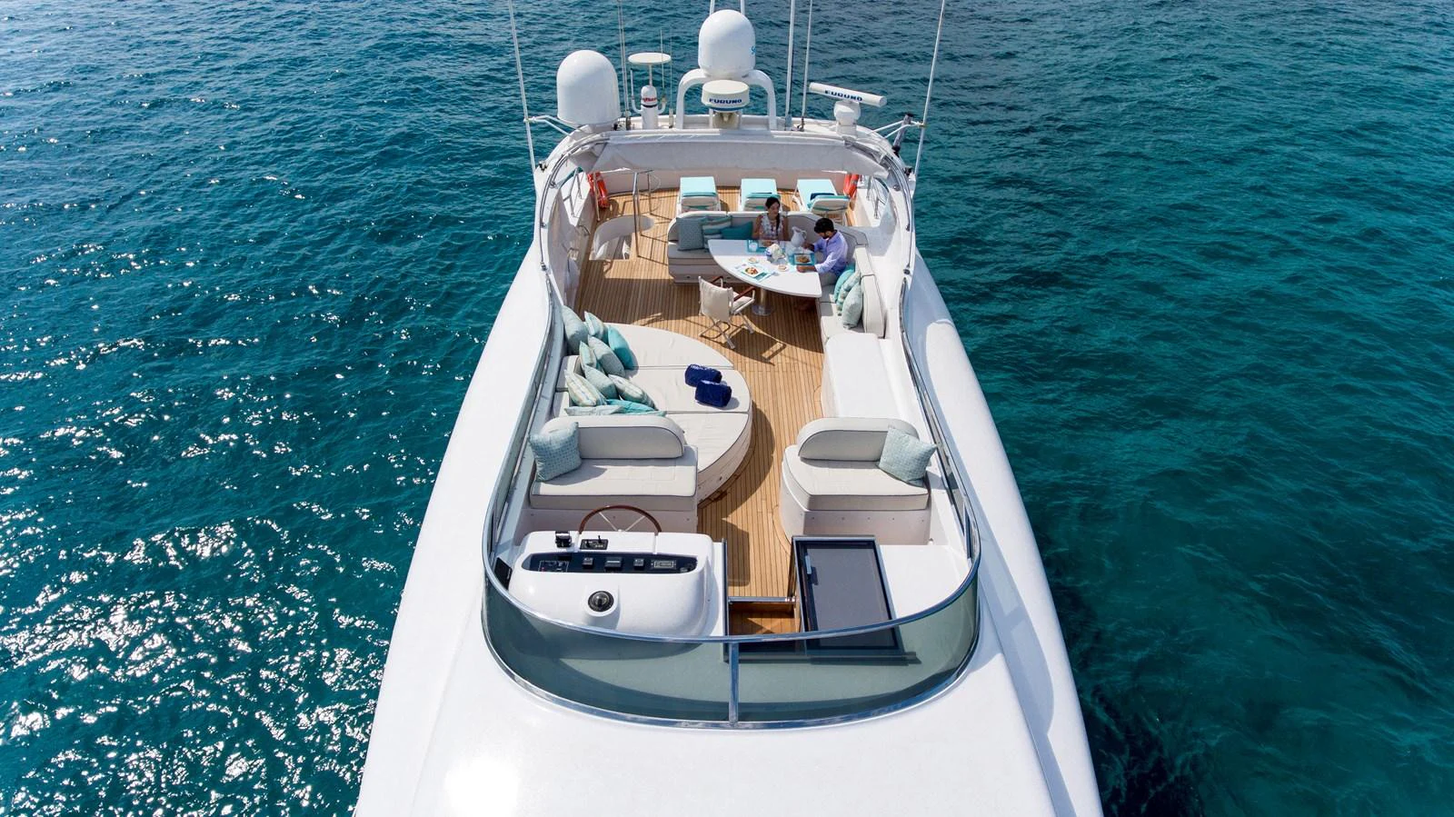 The flybridge offers a spacious and luxurious area for relaxation and socializing with stunning views of the sea. aboard AMAYA Yacht for Sale