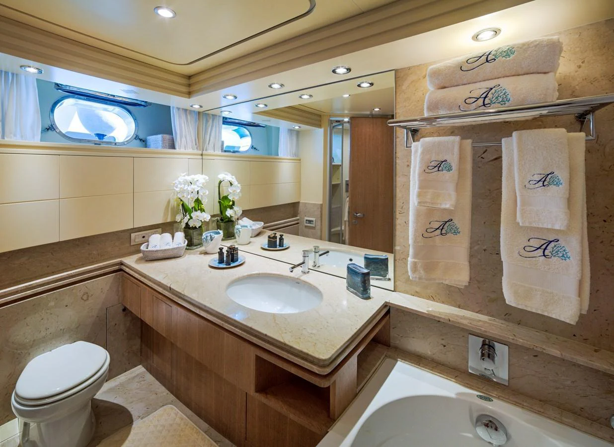 The yacht's bathroom features elegant fixtures and a luxurious design. aboard AMAYA Yacht for Sale