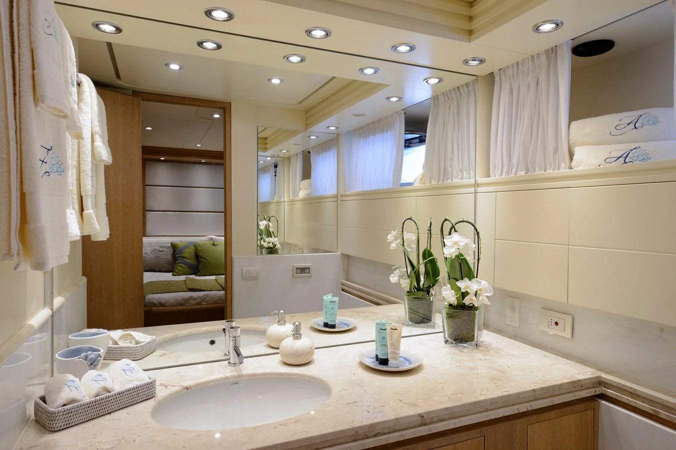 The yacht's bathroom features elegant fixtures and a serene ambiance with ample lighting. aboard AMAYA Yacht for Sale