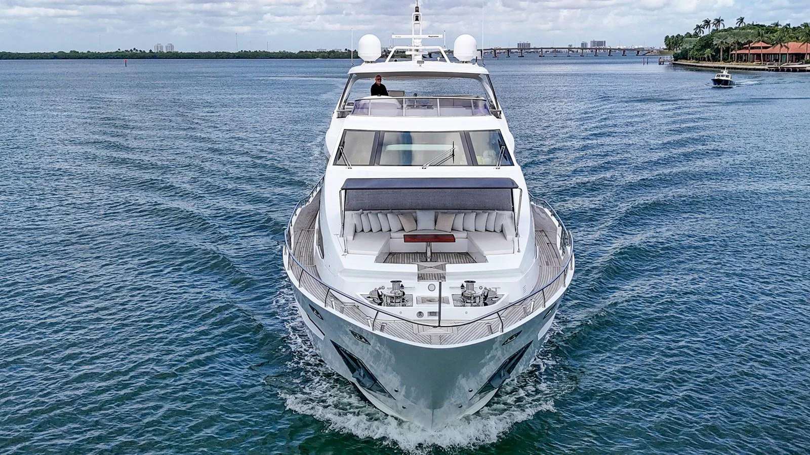 A sleek and modern yacht glides gracefully on the water, showcasing its luxurious design and spacious deck areas. aboard 2017 AZIMUT 30 METRI Yacht for Sale