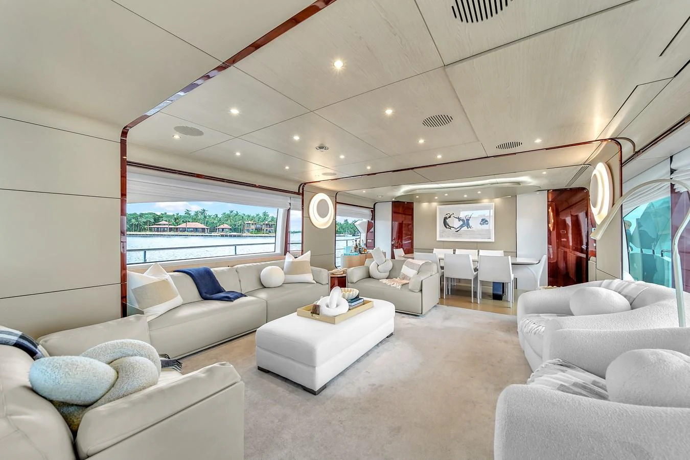 The yacht's salon features plush seating, modern decor, and ample natural light. aboard 2017 AZIMUT 30 METRI Yacht for Sale