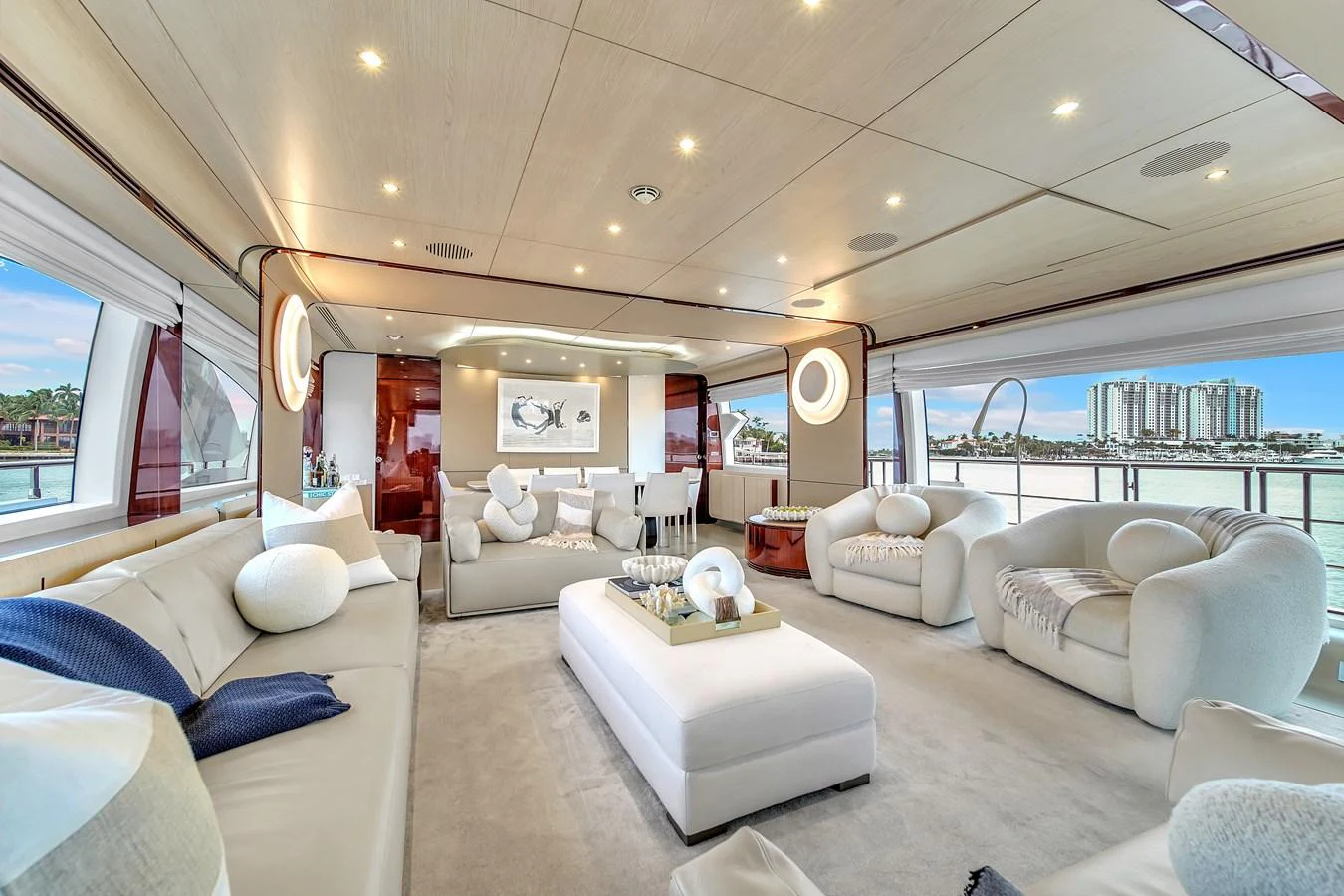 The yacht's salon exudes luxury with its spacious seating, modern decor, and panoramic windows offering stunning views. aboard 2017 AZIMUT 30 METRI Yacht for Sale