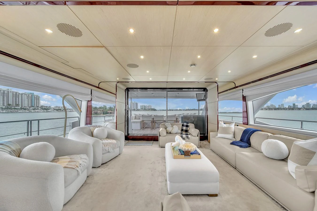 The salon offers a spacious and luxurious seating area with panoramic views of the water. aboard 2017 AZIMUT 30 METRI Yacht for Sale