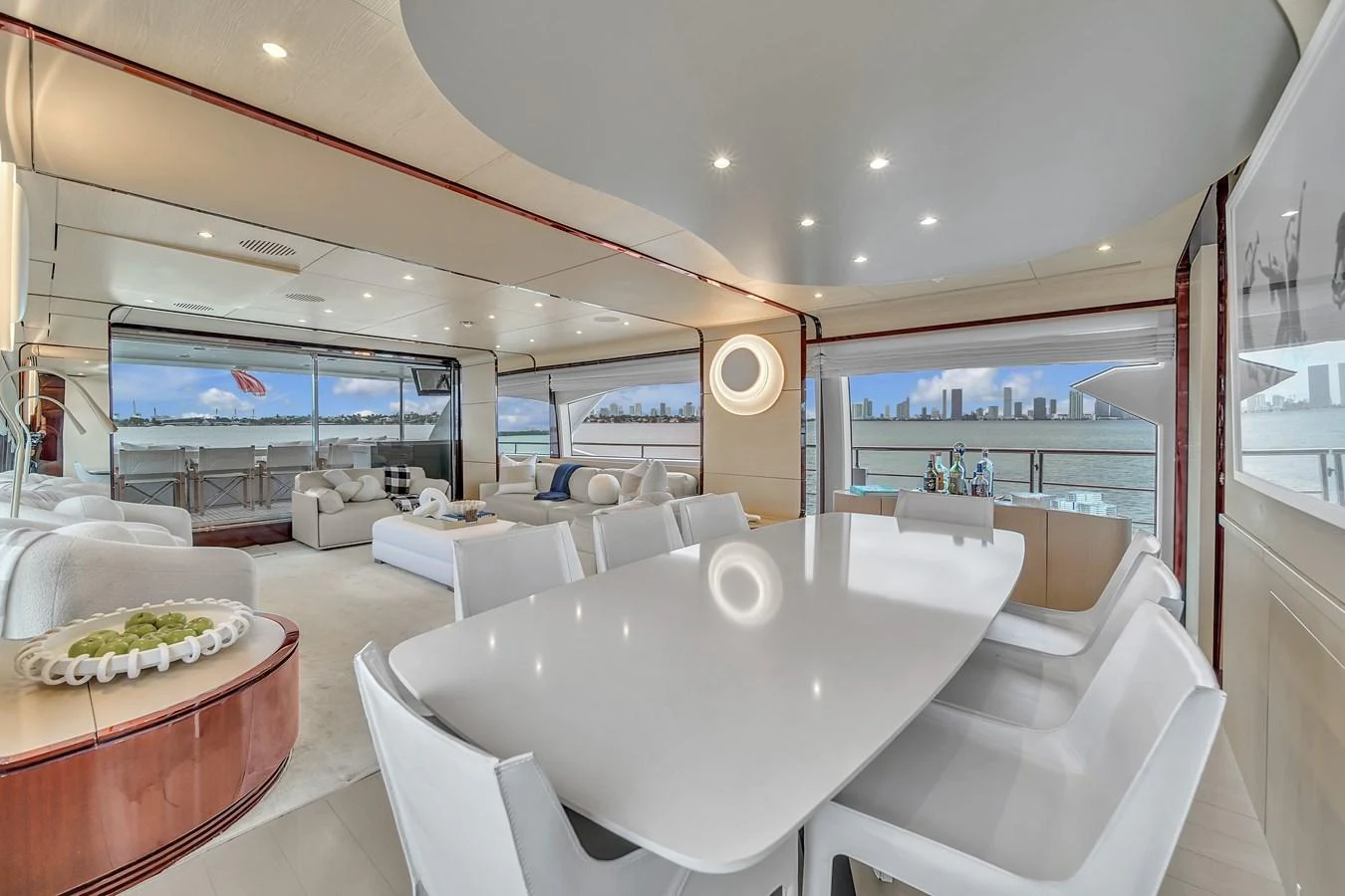 The spacious salon offers a luxurious dining area with panoramic views of the water. aboard 2017 AZIMUT 30 METRI Yacht for Sale