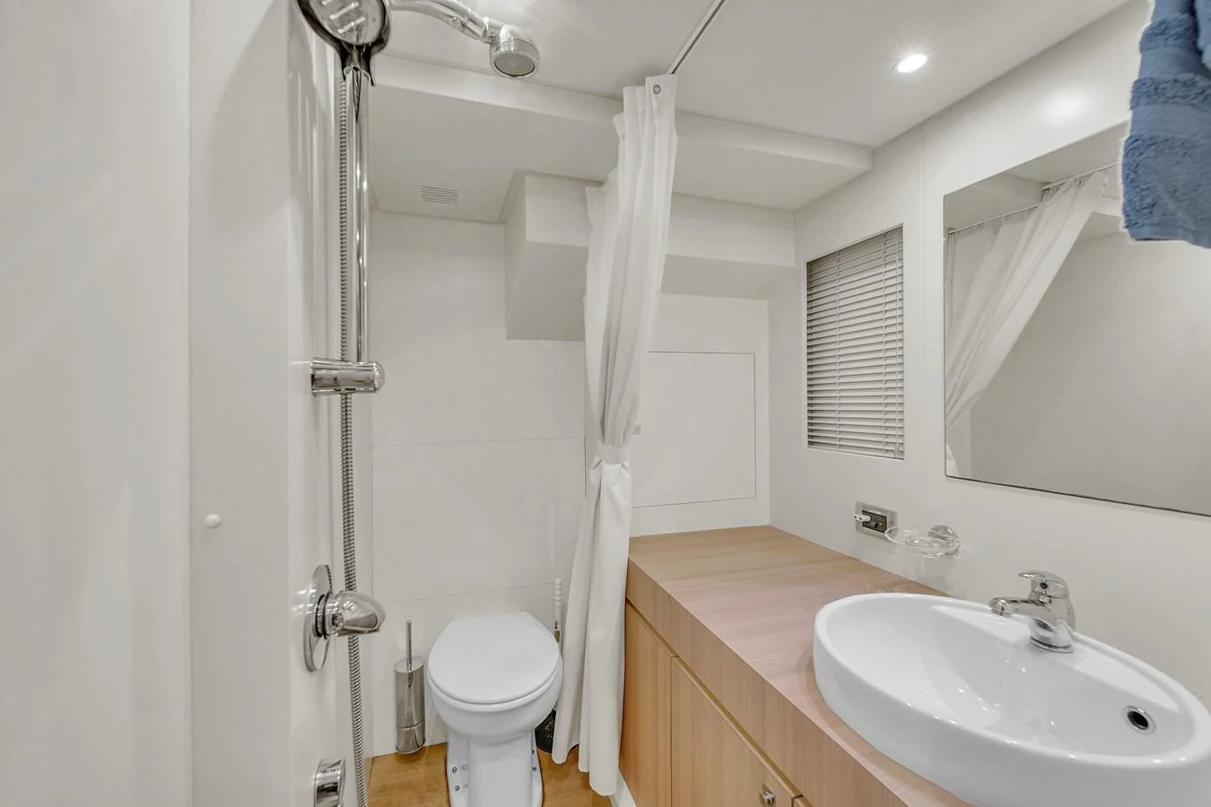 The yacht's bathroom features modern fixtures and a clean, minimalist design. aboard 2017 AZIMUT 30 METRI Yacht for Sale