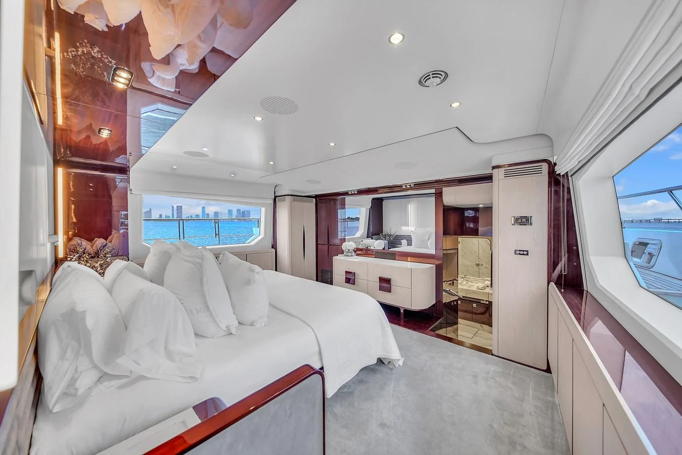 The master stateroom offers a luxurious and spacious retreat with stunning views through large windows. aboard 2017 AZIMUT 30 METRI Yacht for Sale