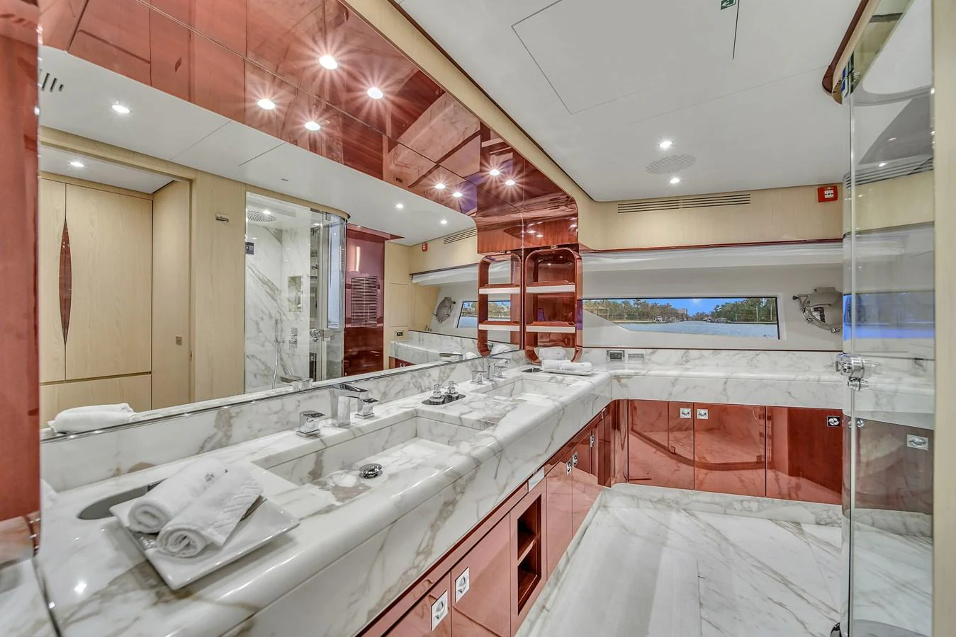 The yacht's bathroom features luxurious marble finishes and modern fixtures. aboard 2017 AZIMUT 30 METRI Yacht for Sale