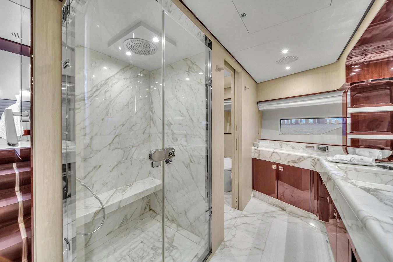 The yacht's bathroom features luxurious marble finishes and modern fixtures. aboard 2017 AZIMUT 30 METRI Yacht for Sale