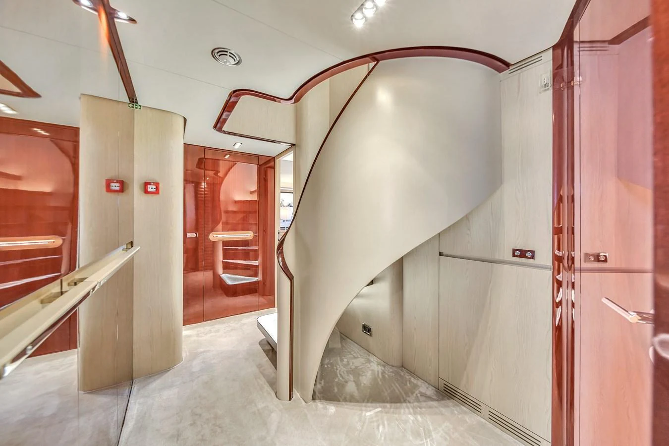 The yacht's interior features a modern, elegant staircase with sleek finishes and ample lighting. aboard 2017 AZIMUT 30 METRI Yacht for Sale