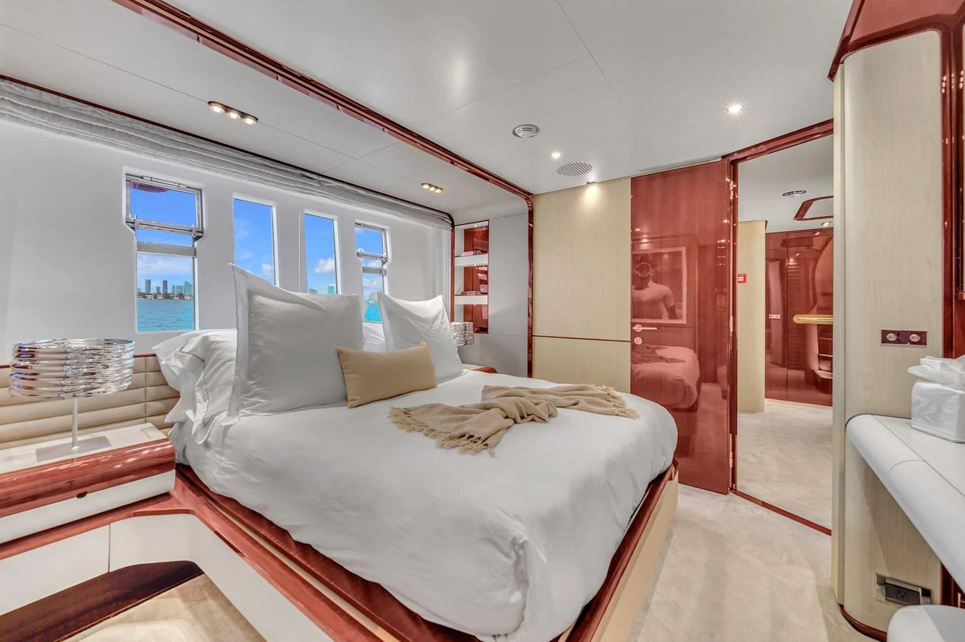 The master stateroom offers a luxurious and spacious retreat with large windows and elegant decor. aboard 2017 AZIMUT 30 METRI Yacht for Sale