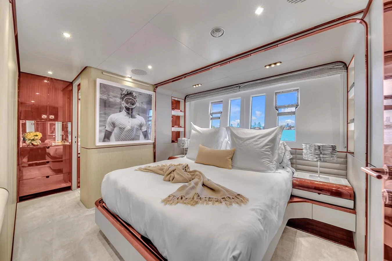 The stateroom features a luxurious bed with plush pillows and a serene ambiance. aboard 2017 AZIMUT 30 METRI Yacht for Sale