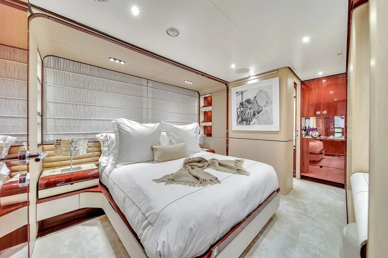 The stateroom offers a luxurious and serene retreat with plush bedding and elegant decor. aboard 2017 AZIMUT 30 METRI Yacht for Sale