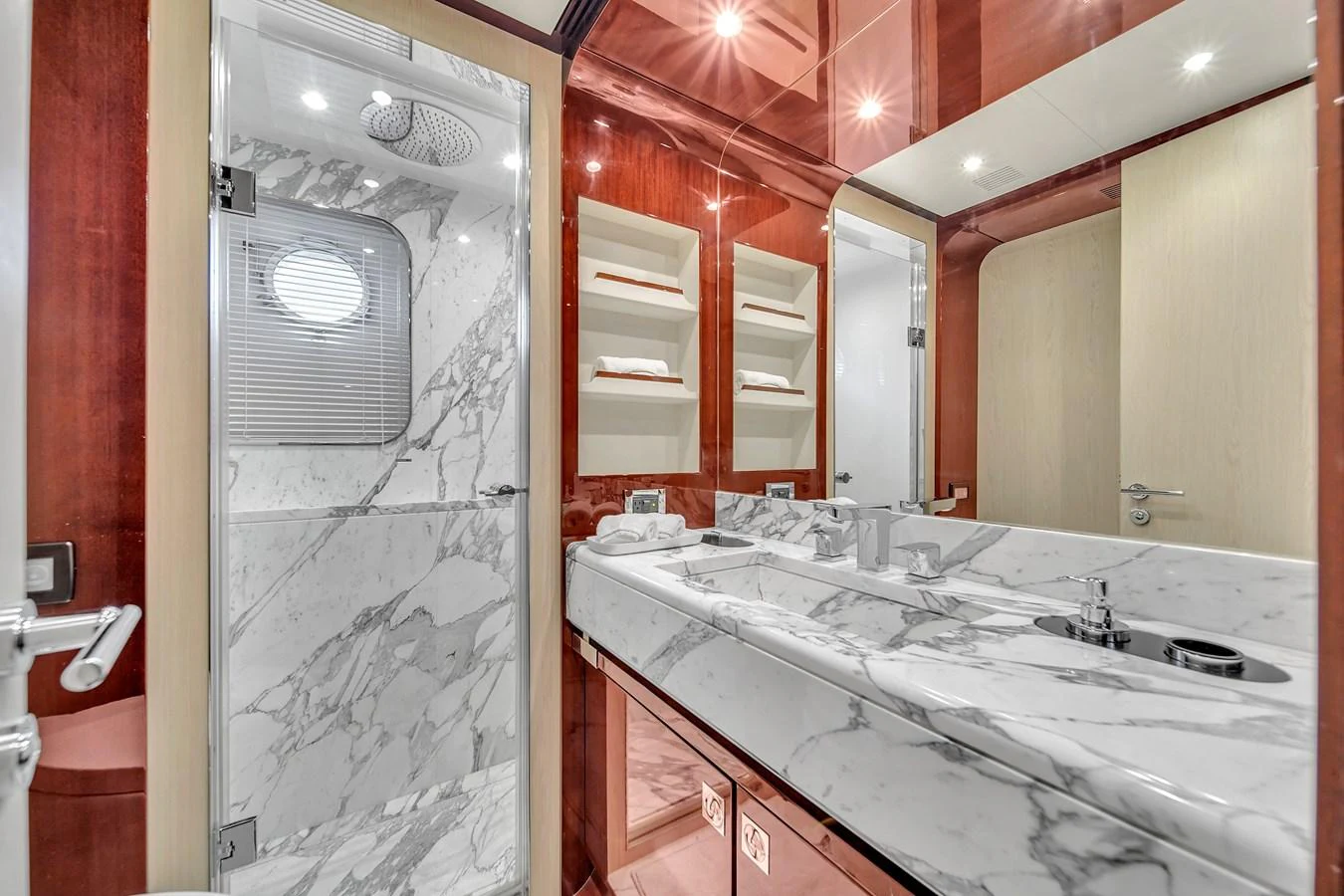 The yacht's bathroom features luxurious marble finishes and modern fixtures. aboard 2017 AZIMUT 30 METRI Yacht for Sale
