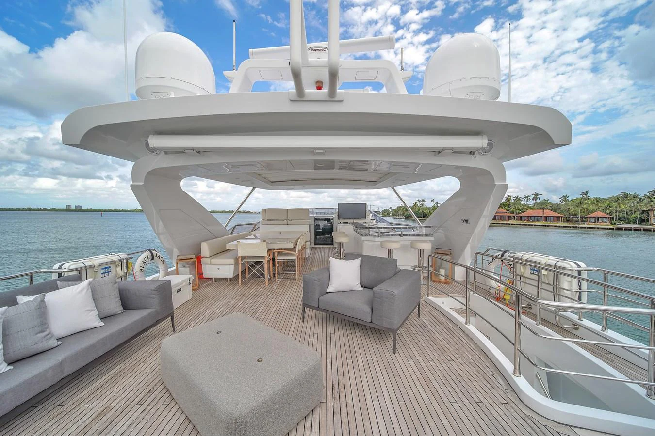 The spacious flybridge offers ample seating and stunning views of the surrounding waters. aboard 2017 AZIMUT 30 METRI Yacht for Sale