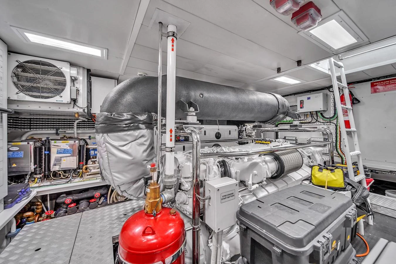 The yacht's engine room is equipped with advanced machinery and well-organized systems. aboard 2017 AZIMUT 30 METRI Yacht for Sale