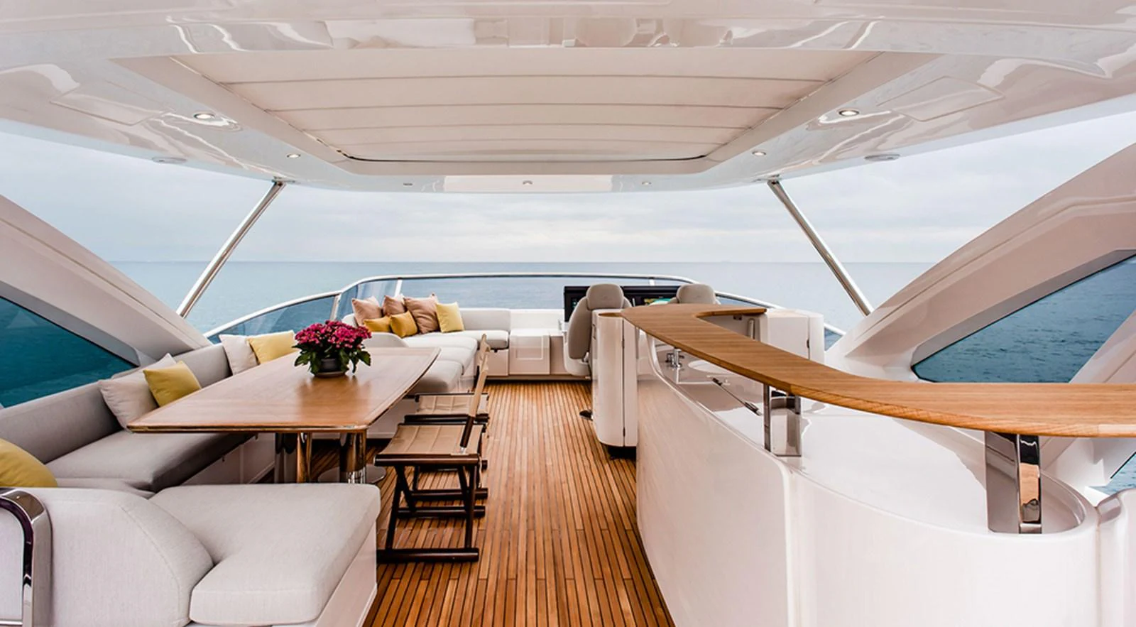 The aft deck offers a spacious and luxurious seating area with panoramic ocean views. aboard LASTOCHKA Yacht for Sale