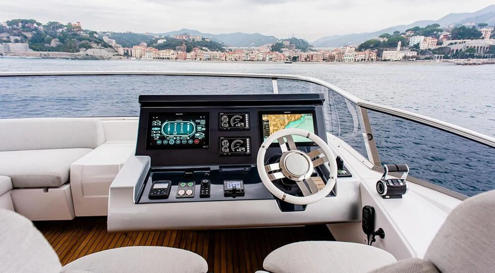 The helm station offers a commanding view with state-of-the-art navigation equipment and luxurious seating. aboard LASTOCHKA Yacht for Sale