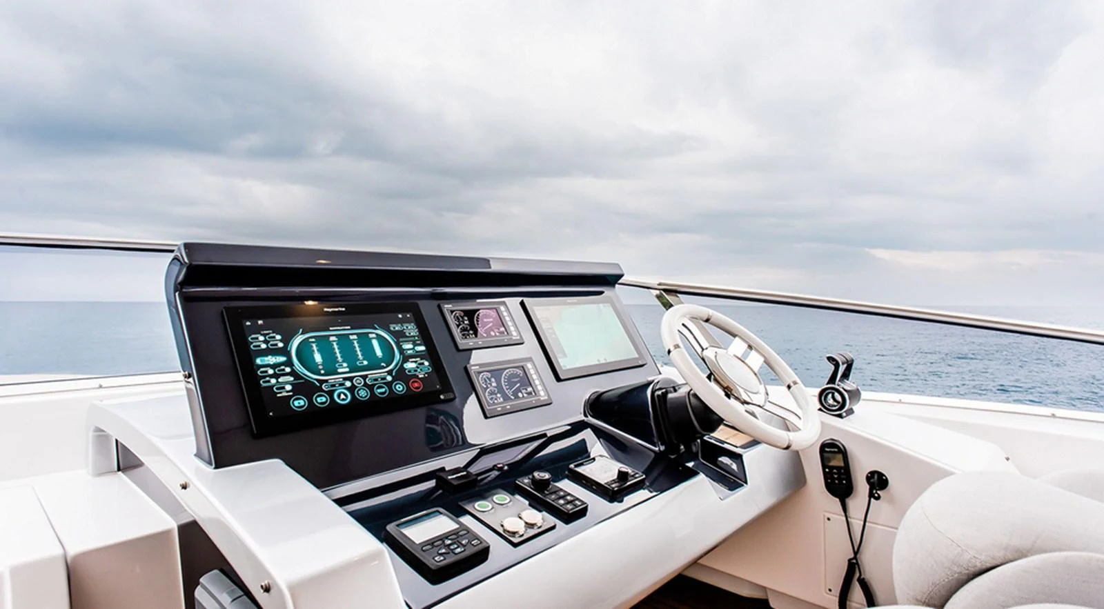 The helm station features advanced navigation equipment and a comfortable captain's chair, offering a commanding view of the open sea. aboard LASTOCHKA Yacht for Sale