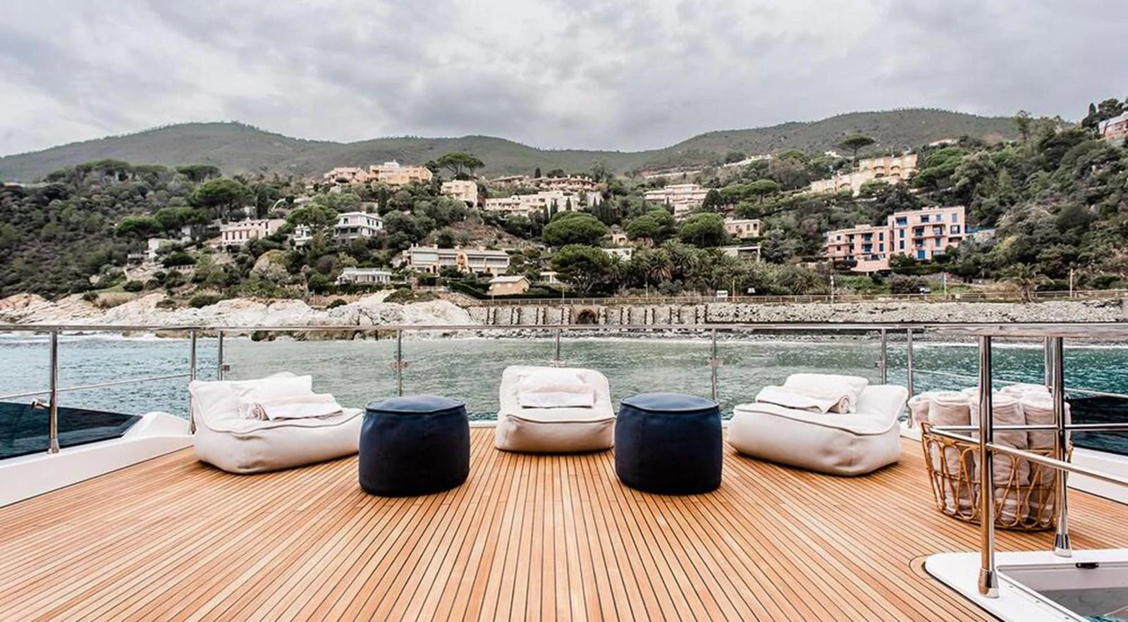 The aft deck features a spacious lounging area with comfortable seating and scenic views. aboard LASTOCHKA Yacht for Sale