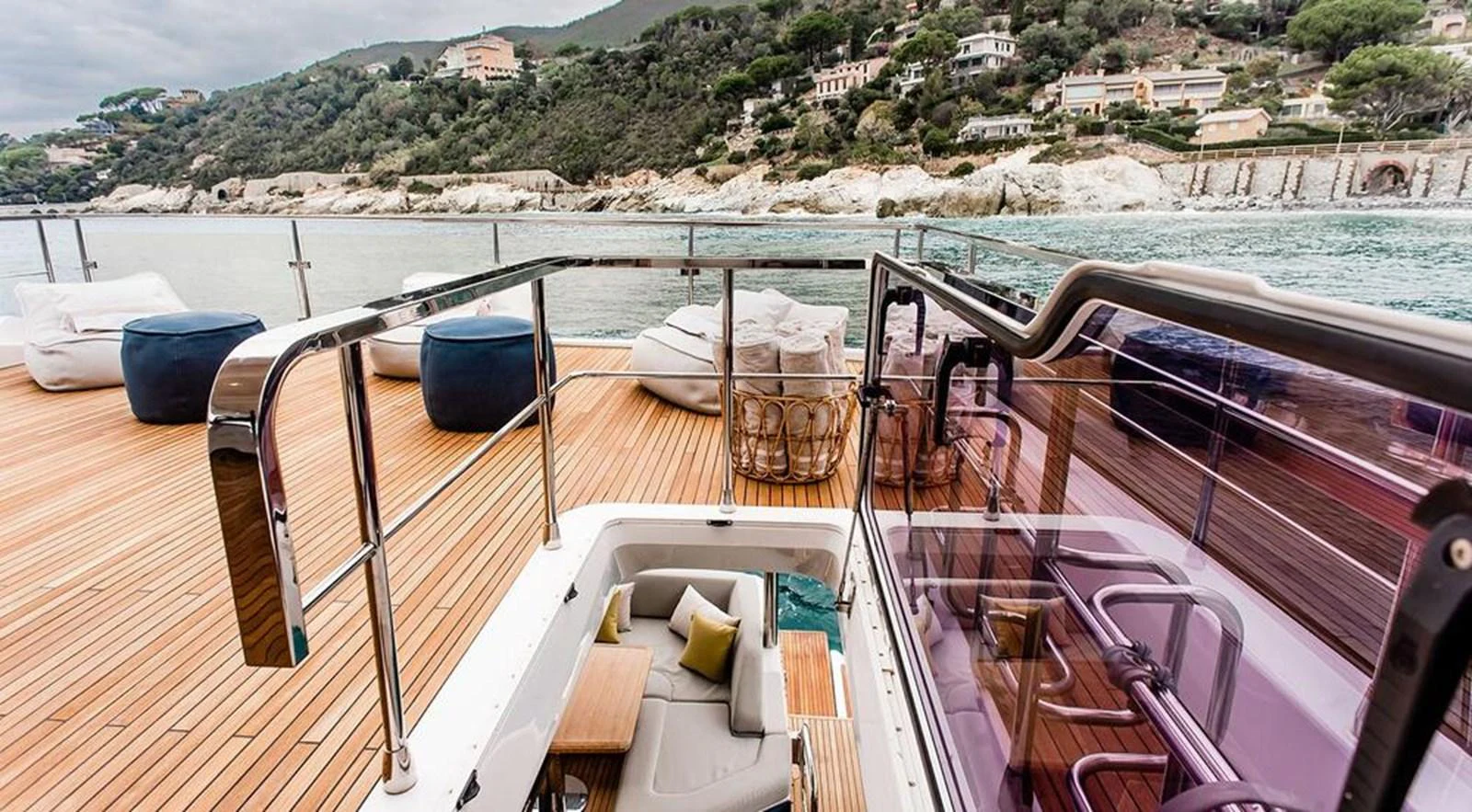The aft deck offers a luxurious space with comfortable seating and stunning views of the coastline. aboard LASTOCHKA Yacht for Sale
