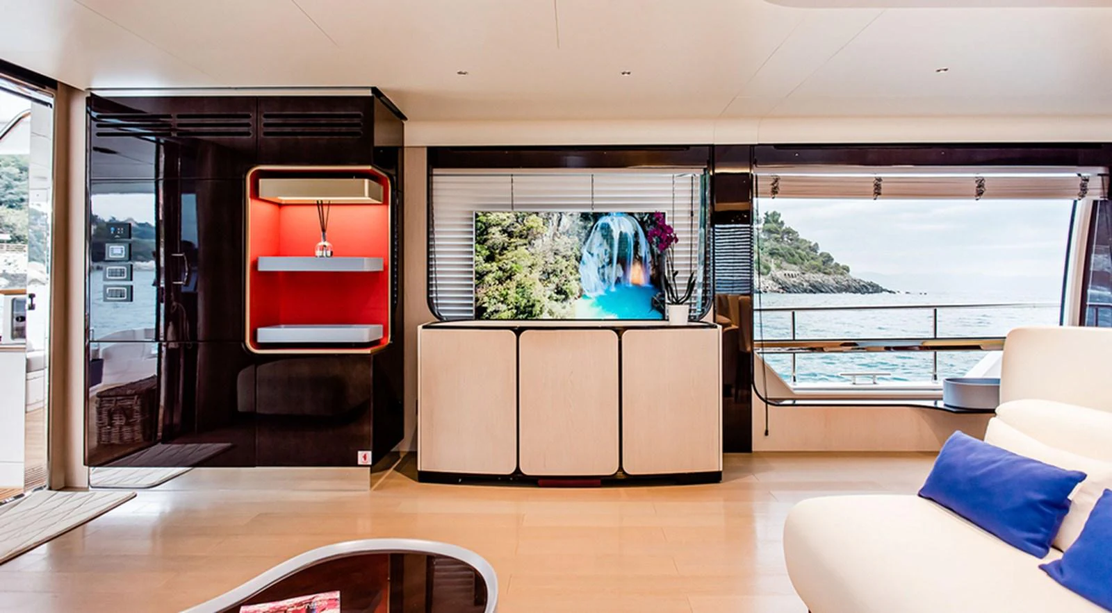 The salon features modern decor with a large window offering stunning sea views. aboard LASTOCHKA Yacht for Sale