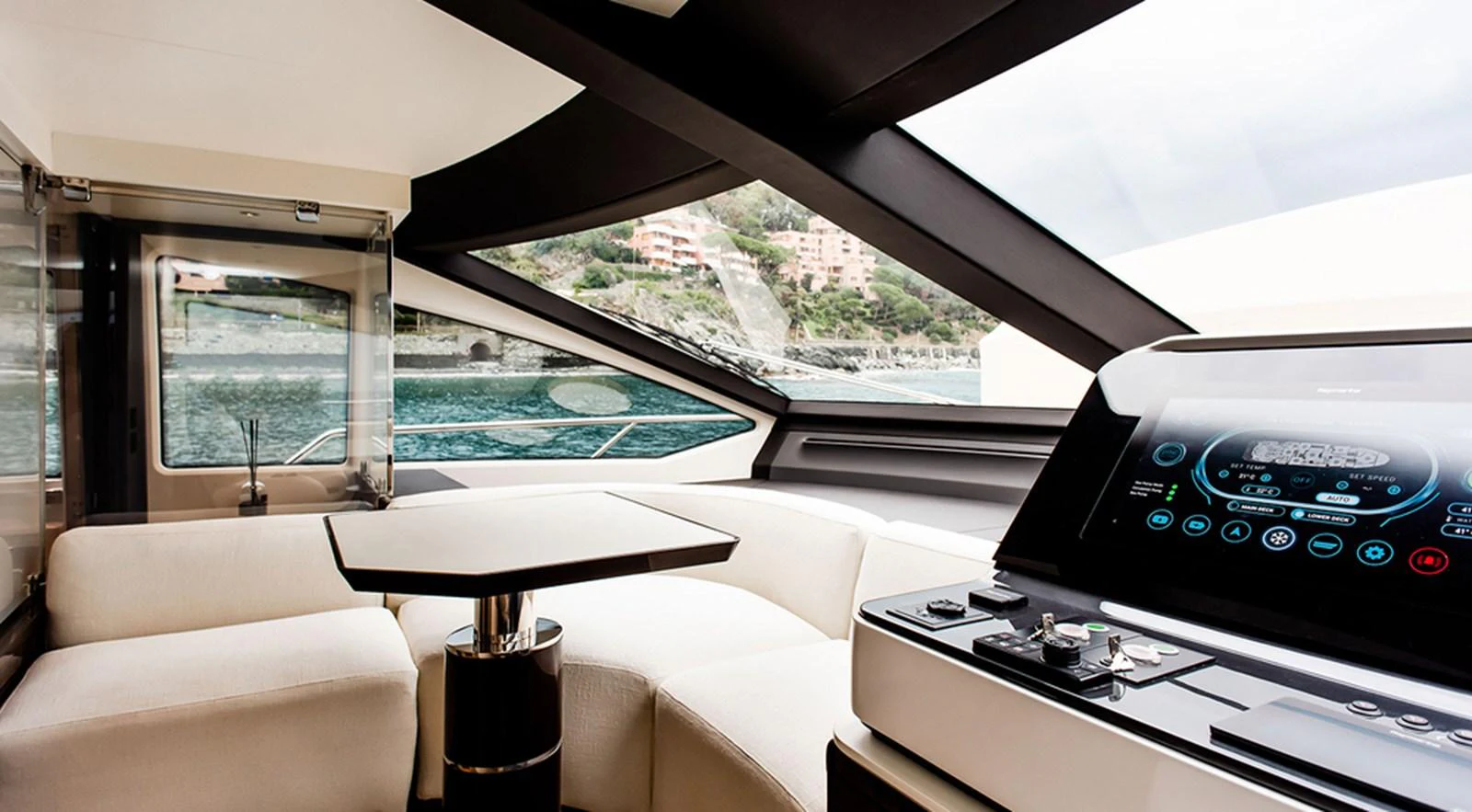 The yacht's helm features modern controls and a comfortable seating area with stunning views. aboard LASTOCHKA Yacht for Sale