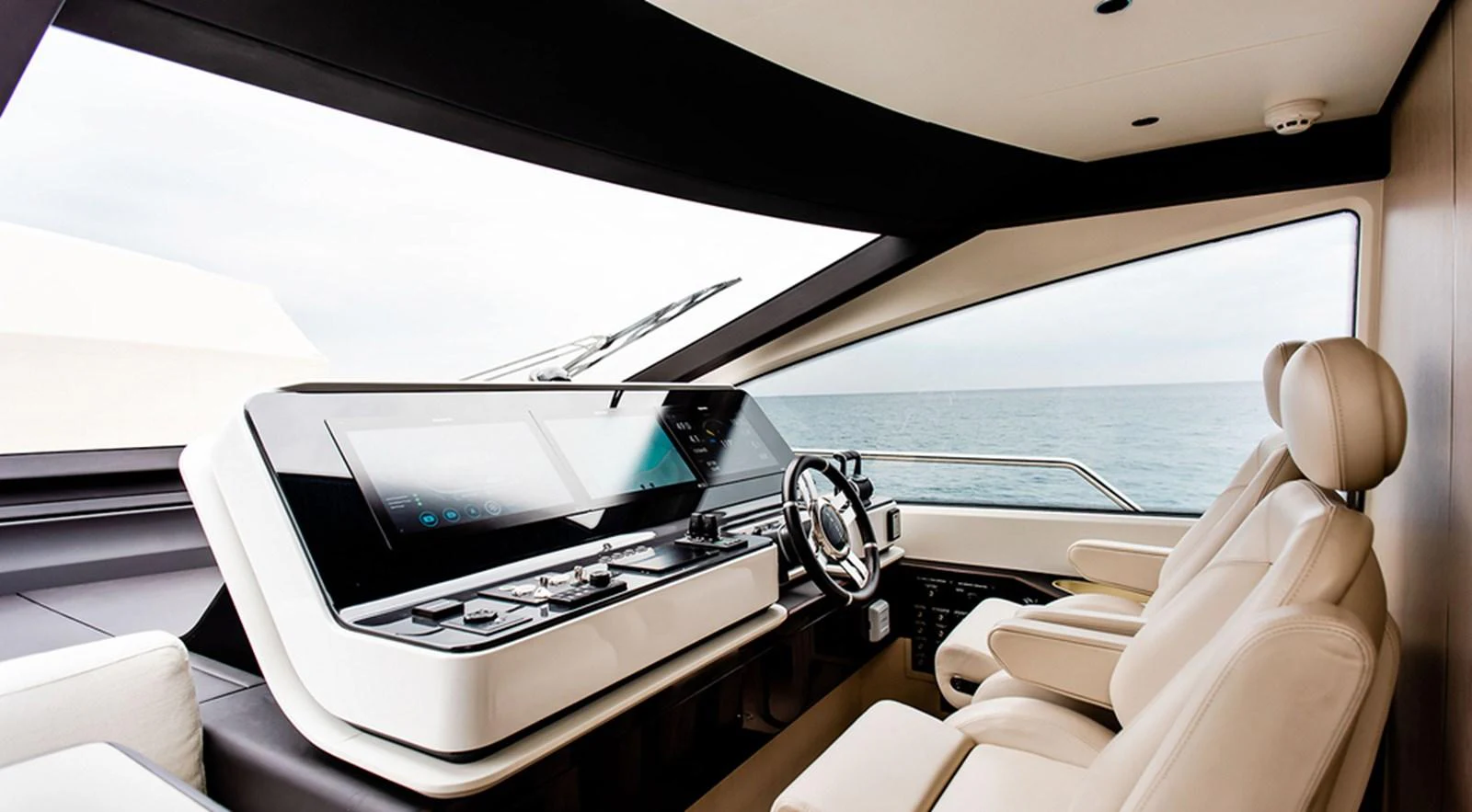 The helm of the yacht features modern navigation equipment and luxurious seating with a panoramic view of the sea. aboard LASTOCHKA Yacht for Sale