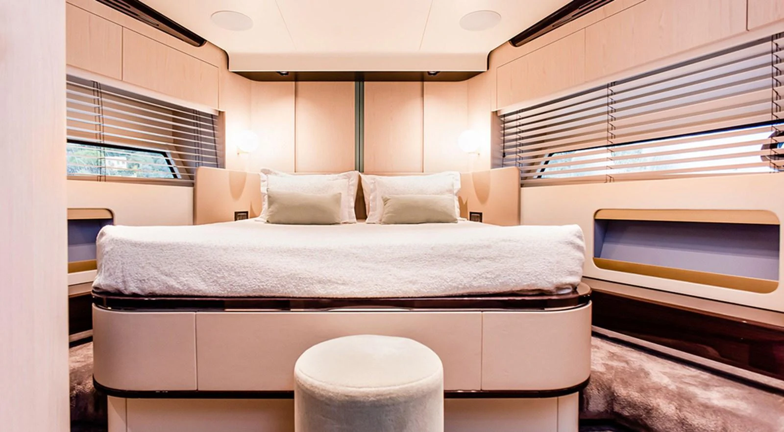 The master stateroom features a luxurious bed with modern decor and ample natural light. aboard LASTOCHKA Yacht for Sale