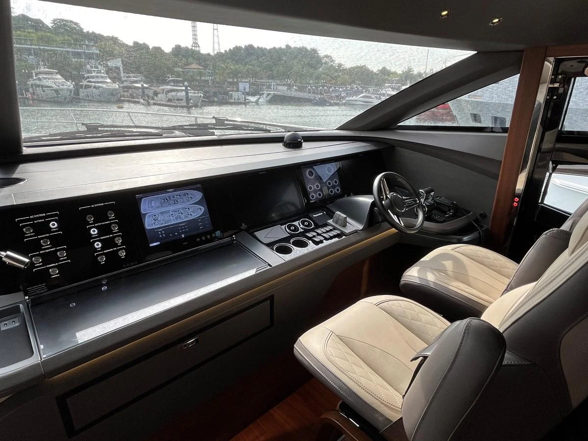 The helm station offers a sophisticated control area with advanced navigation systems and comfortable seating. aboard LILYAN Yacht for Sale