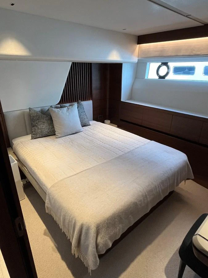 A cozy stateroom with a comfortable bed and modern decor. aboard LILYAN Yacht for Sale
