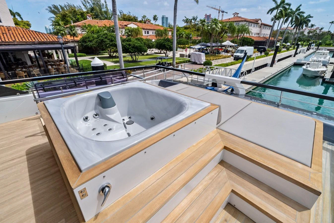 The sundeck features a luxurious jacuzzi with ample lounging space, perfect for relaxation. aboard LADY F Yacht for Sale
