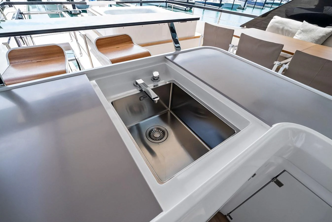 A sleek stainless steel sink area on the yacht, perfect for outdoor entertaining. aboard LADY F Yacht for Sale