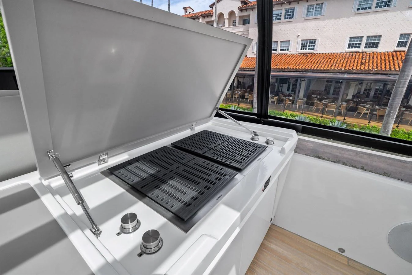 This yacht features a sleek and modern grill area, perfect for outdoor cooking and entertaining. aboard LADY F Yacht for Sale