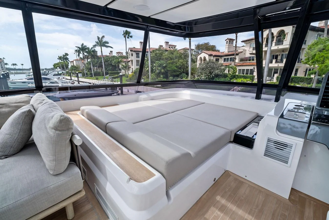This inviting lounge area offers panoramic views and plush seating for relaxation. aboard LADY F Yacht for Sale
