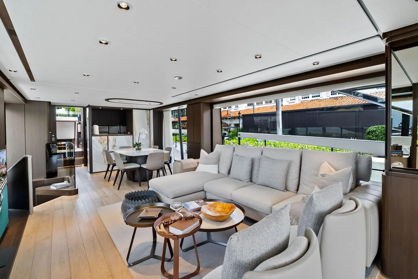 The salon features a spacious and modern design with ample seating and elegant decor. aboard LADY F Yacht for Sale