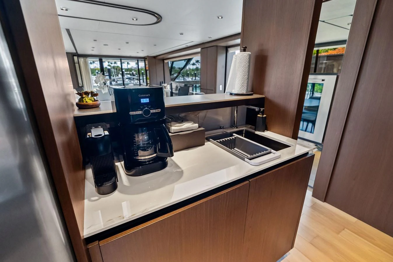 The yacht's galley features modern appliances and a sleek design, perfect for gourmet meal preparation. aboard LADY F Yacht for Sale
