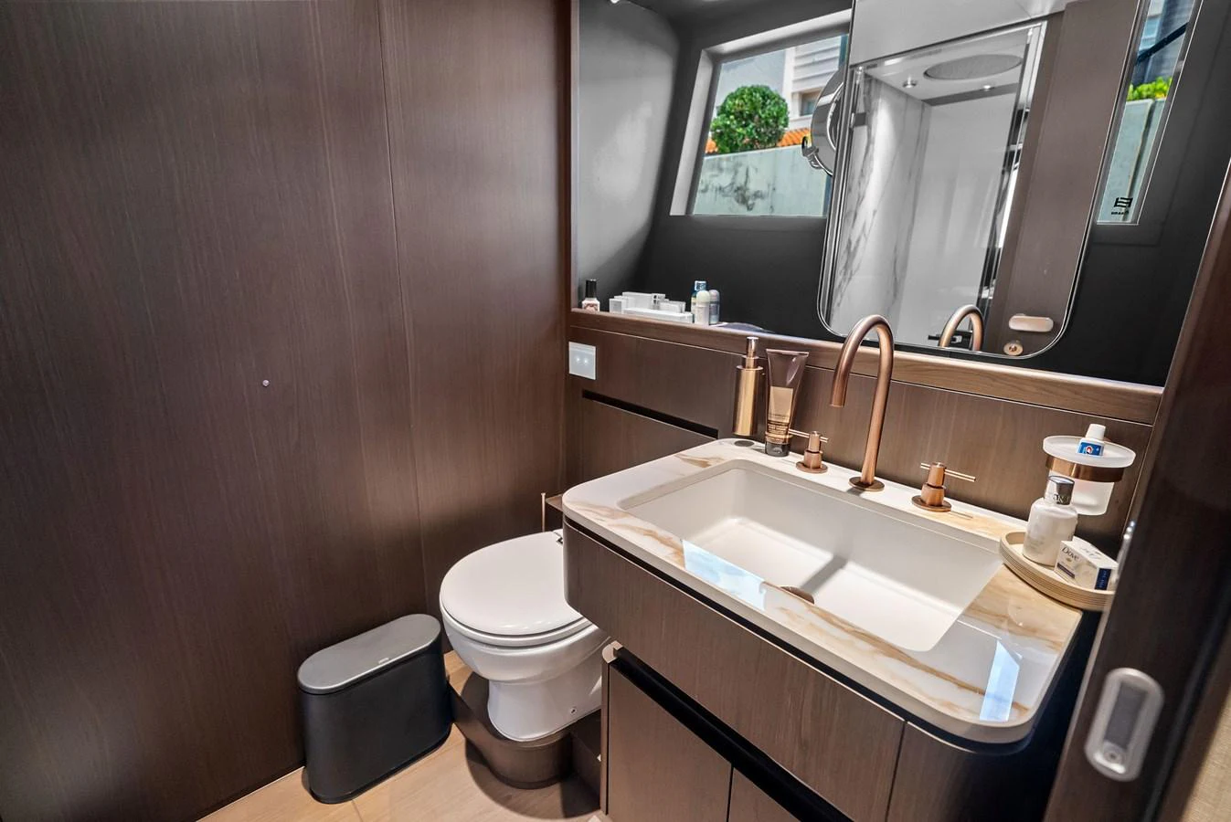The yacht's bathroom features modern fixtures and a sleek design. aboard LADY F Yacht for Sale